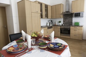 Appartement Supérieur, cuisine (Ouverture) | Restauration dans la chambre