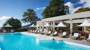 Outdoor pool, pool umbrellas, sun loungers