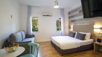 Monolocale familiare (Garden Access) | 1 camera, minibar, una scrivania, insonorizzazione