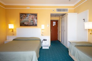 A hotel room with two beds, a painting on the wall, and a door leading to another room. - Cervara Park Hotel (Rome)