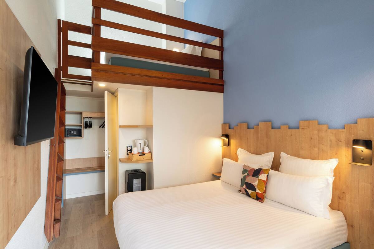 Standard Room, Multiple Beds, Non Smoking, Mezzanine | Minibar, in-room safe, desk, blackout drapes