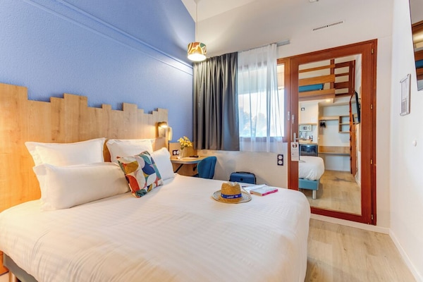 Standard Room, Multiple Beds, Non Smoking, Mezzanine | Minibar, in-room safe, desk, blackout drapes