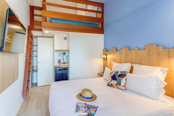 Standard Room, Multiple Beds, Non Smoking, Mezzanine | Minibar, in-room safe, desk, blackout drapes