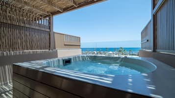 Petite Suite Sea View with Outdoor Hot Tub | 1 bedroom, free minibar, in-room safe, desk