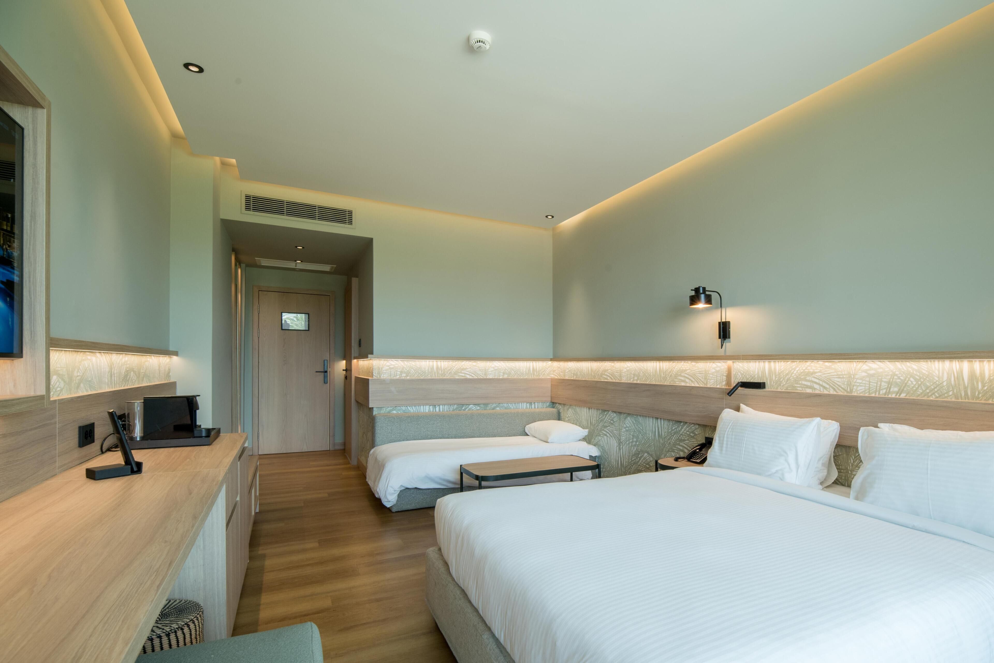 Classic Quadruple Room | Free minibar, in-room safe, desk, blackout drapes