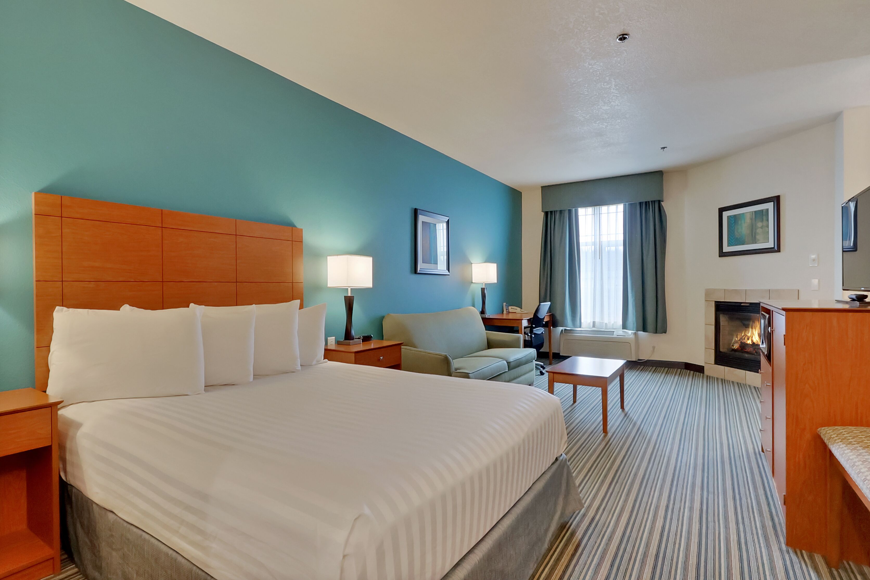 suite, 2 queen beds, non smoking, fireplace | 1 bedroom, desk, blackout curtains, iron/ironing board