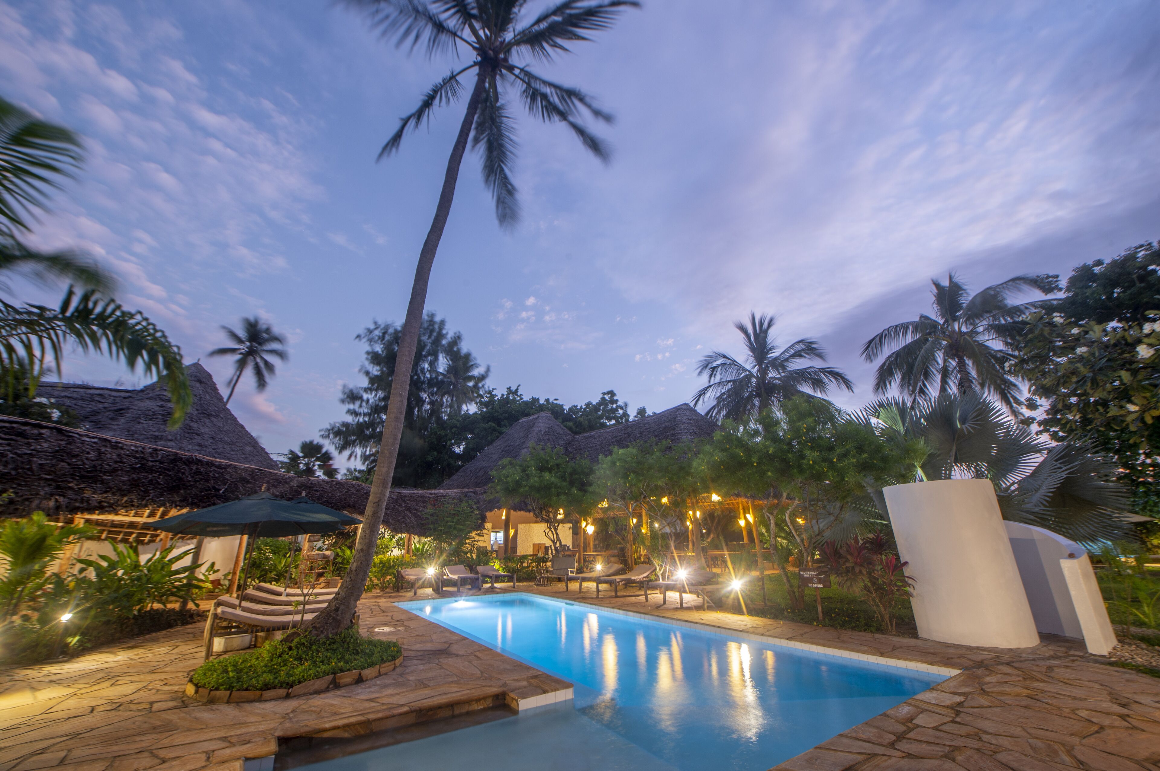 2 outdoor pools, pool umbrellas, pool loungers