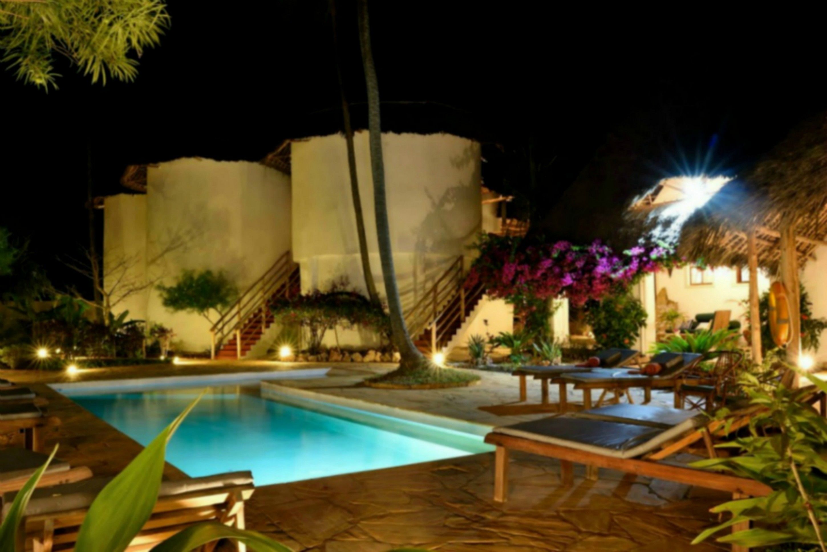 2 outdoor pools, pool umbrellas, pool loungers