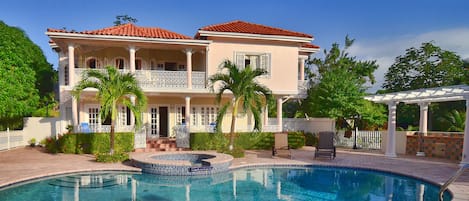 2 outdoor pools, pool umbrellas, pool loungers