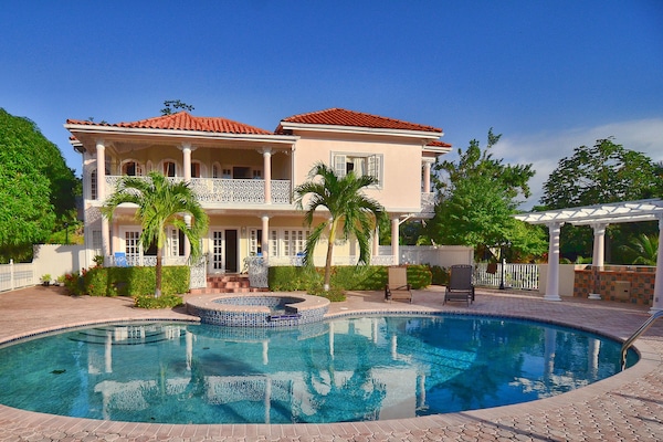 2 outdoor pools, pool umbrellas, sun loungers