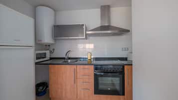 Standard Apartment, 1 Bedroom | Private kitchen | Fridge, microwave, stovetop, toaster