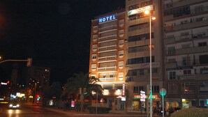 A multi-story hotel with a prominent "HOTEL" sign on the facade, multiple balconies, and a ground-level entrance. - Hotel Marina Victoria (Algeciras)