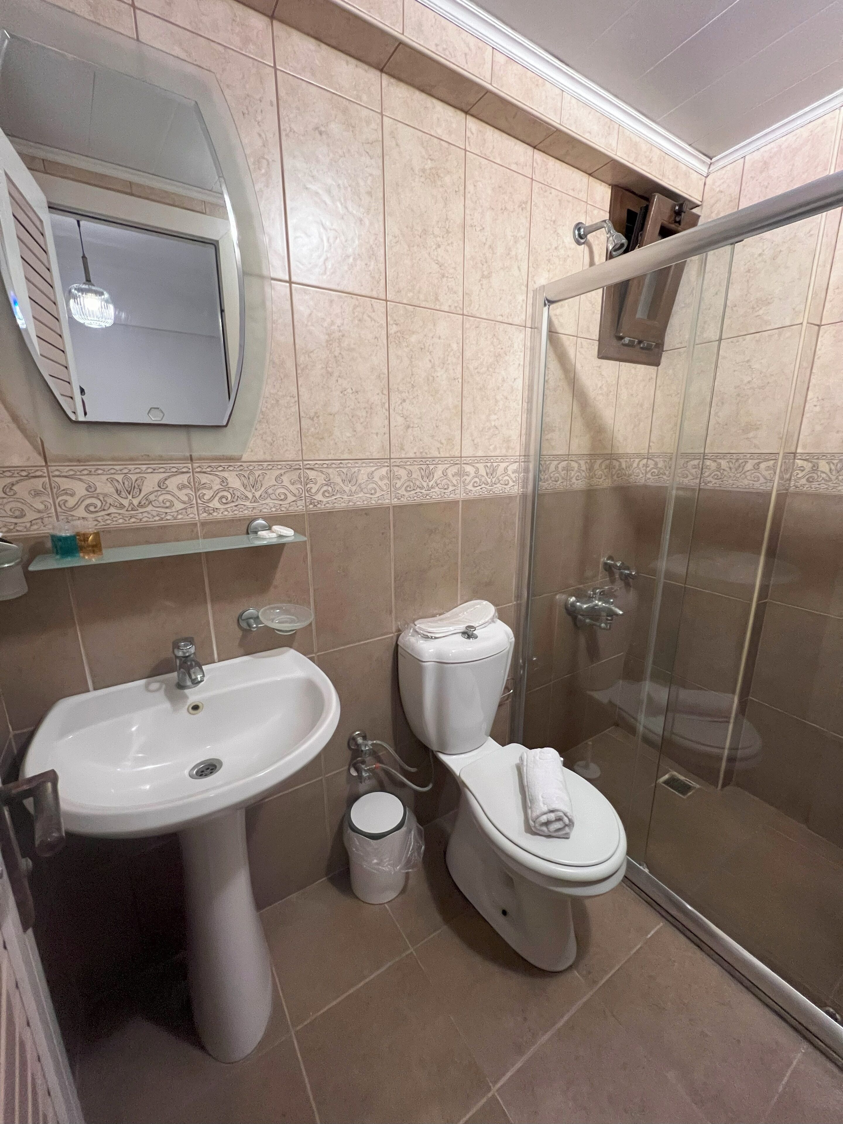 economy double or twin room | bathroom | shower, hair dryer, slippers, towels