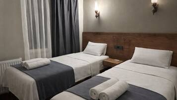 Premium bedding, iron/ironing board, free WiFi, bed sheets