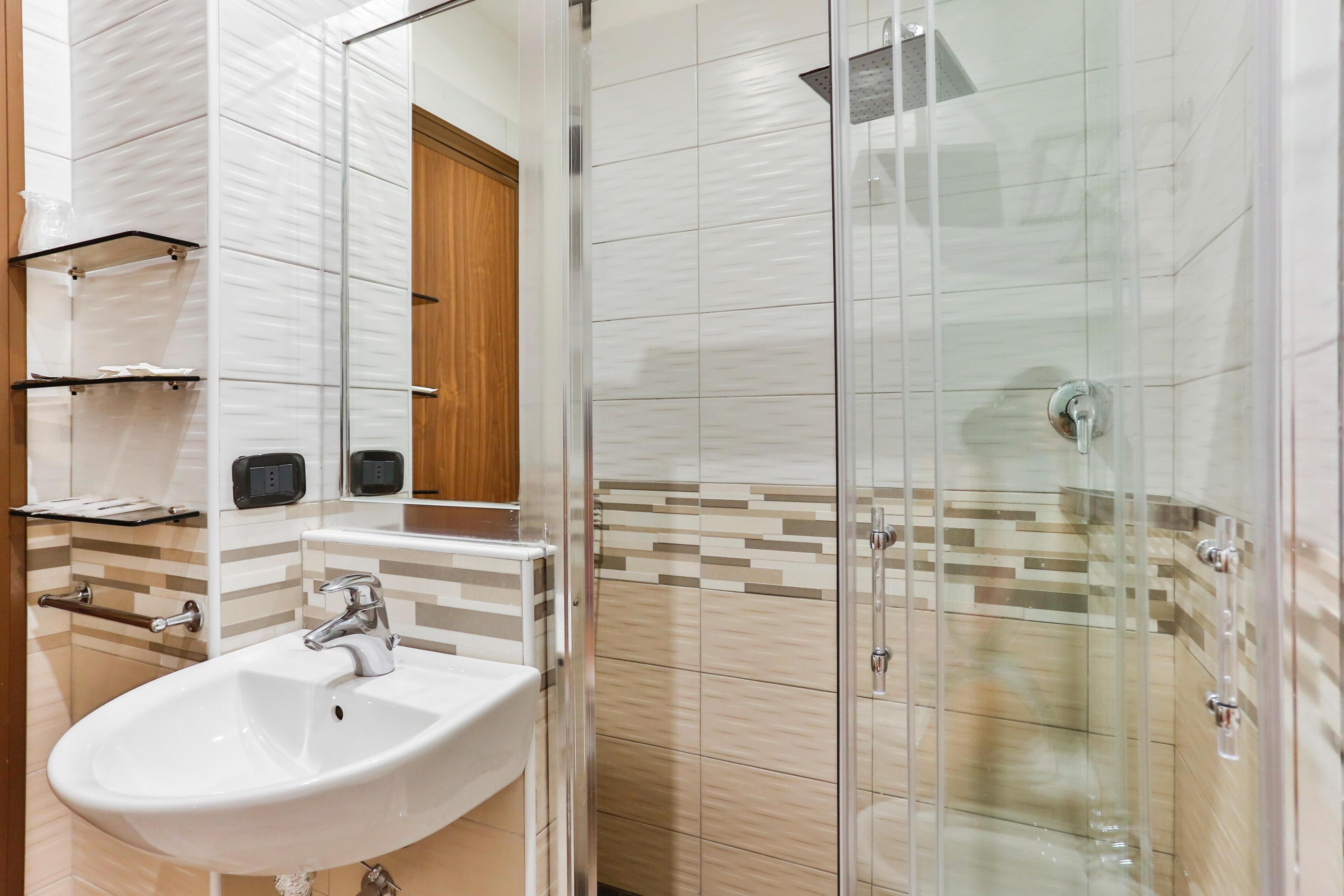 Shower, rainfall showerhead, designer toiletries