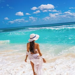 On the beach, white sand, free beach cabanas, sun loungers