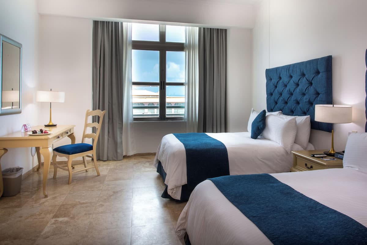 Sandos Suite | Pillow-top beds, free minibar, in-room safe, desk