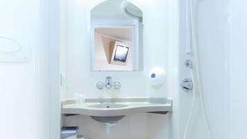 Rainfall showerhead, eco-friendly toiletries, towels, toilet paper