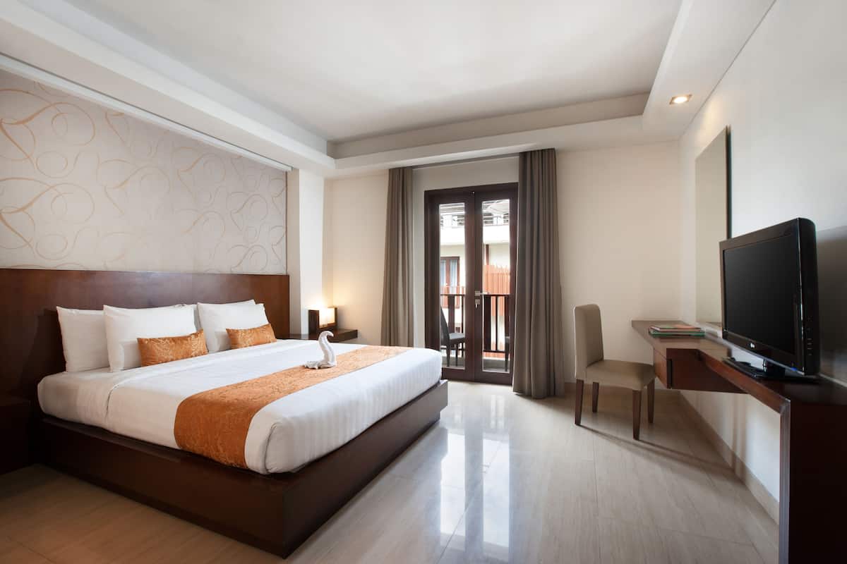 Deluxe Room, Balcony | 1 bedroom, memory foam beds, minibar, in-room safe