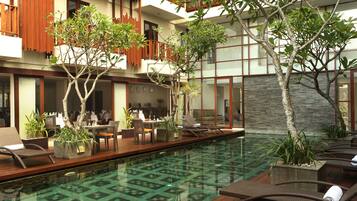 Outdoor pool, pool umbrellas, pool loungers