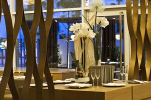 Lunch, dinner served; Mediterranean cuisine, garden views 