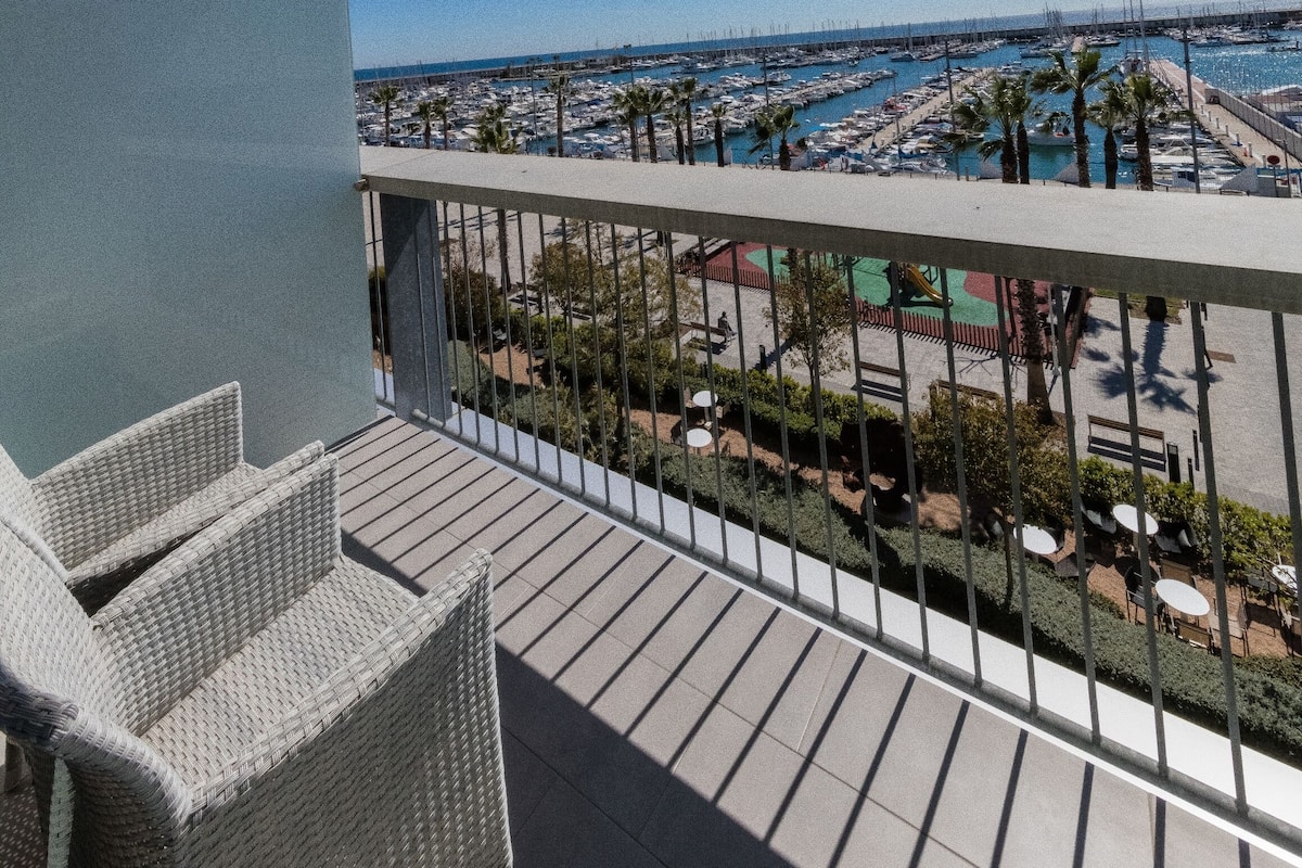 Enjoy the serene marina views from this balcony.