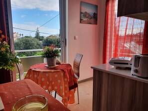 Apartment, 1 Bedroom | Private kitchen | Fridge, microwave, stovetop, electric kettle