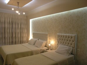 Premium bedding, down comforters, pillowtop beds, in-room safe