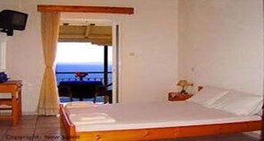 Habitación estándar, vista a la bahía | Ropa de cama de alta calidad y caja de seguridad en la habitación 