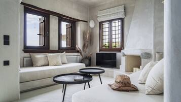 Family Suite, Sea View | Living area | TV