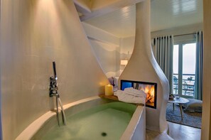 Shower, rainfall showerhead, designer toiletries, hair dryer