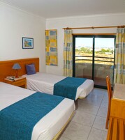 Desk, blackout curtains, soundproofing, travel cot