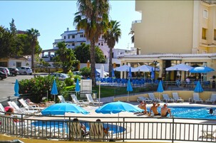 Outdoor pool, pool umbrellas, pool loungers