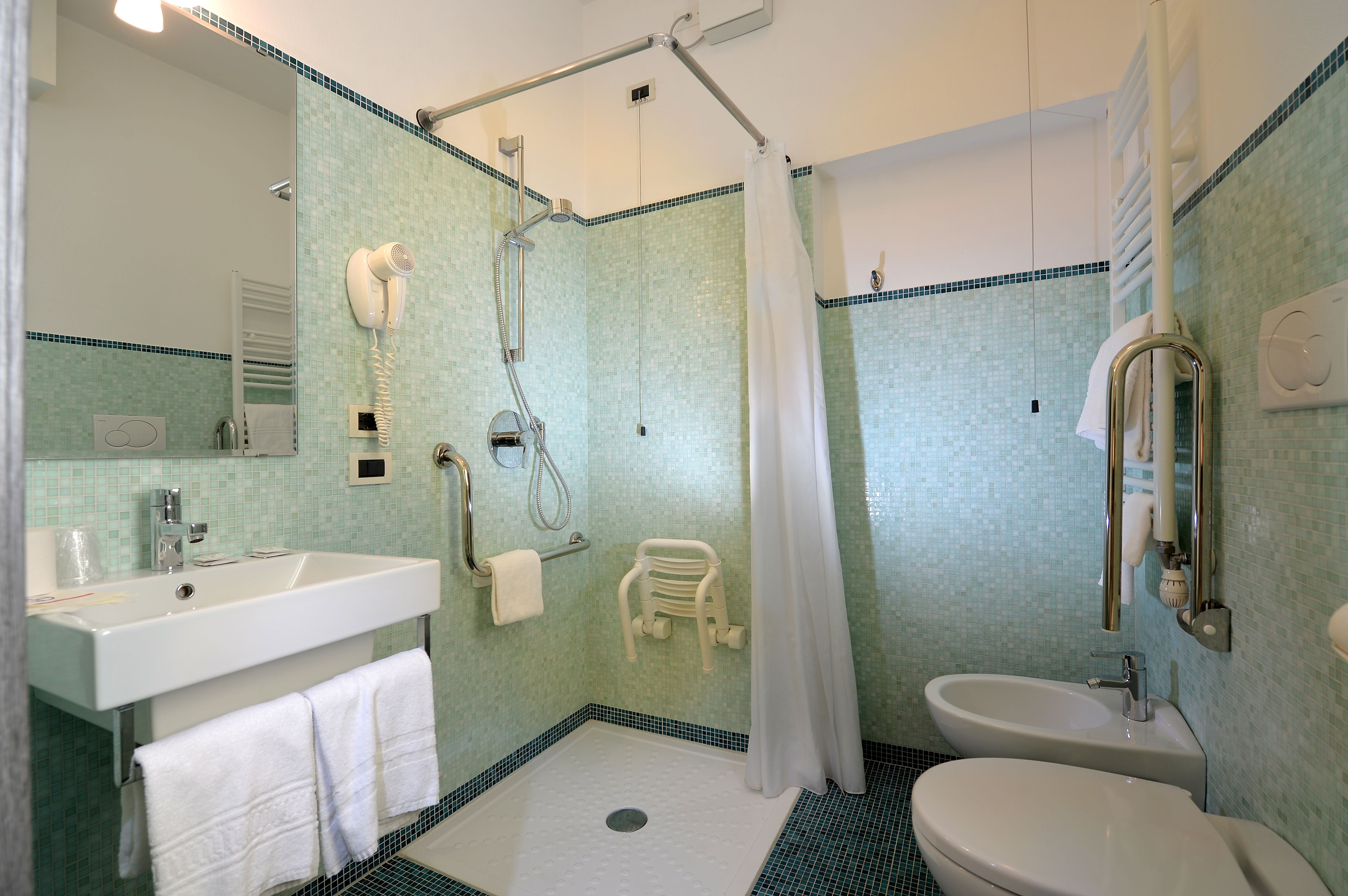 double or twin room | bathroom | shower, eco-friendly toiletries, hair dryer, towels