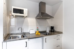 Standard Apartment | Private kitchen | Full-size fridge, microwave, stovetop, electric kettle