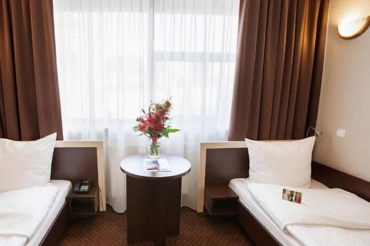 Pillowtop beds, desk, iron/ironing board (on request), WiFi (free)