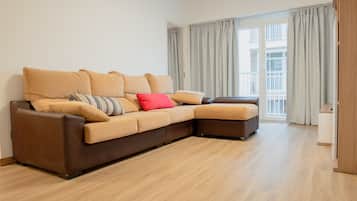 Apartment, 2 Bedrooms | Living room | 19-inch flat-screen TV with satellite channels, TV