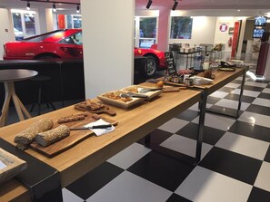 Daily buffet breakfast (EUR 9.50 per person) - Enzo Trappes by Kyriad Direct (Trappes)