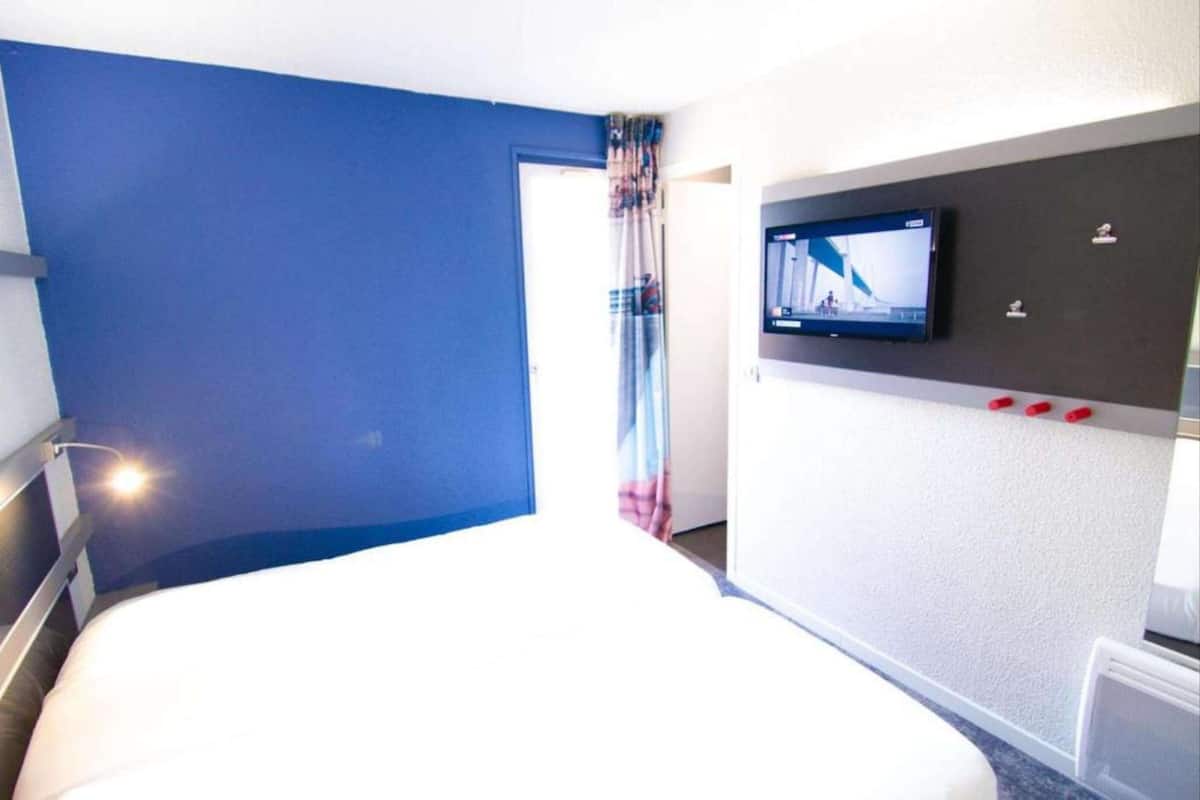 Desk, blackout curtains, free cots/infant beds, rollaway beds
