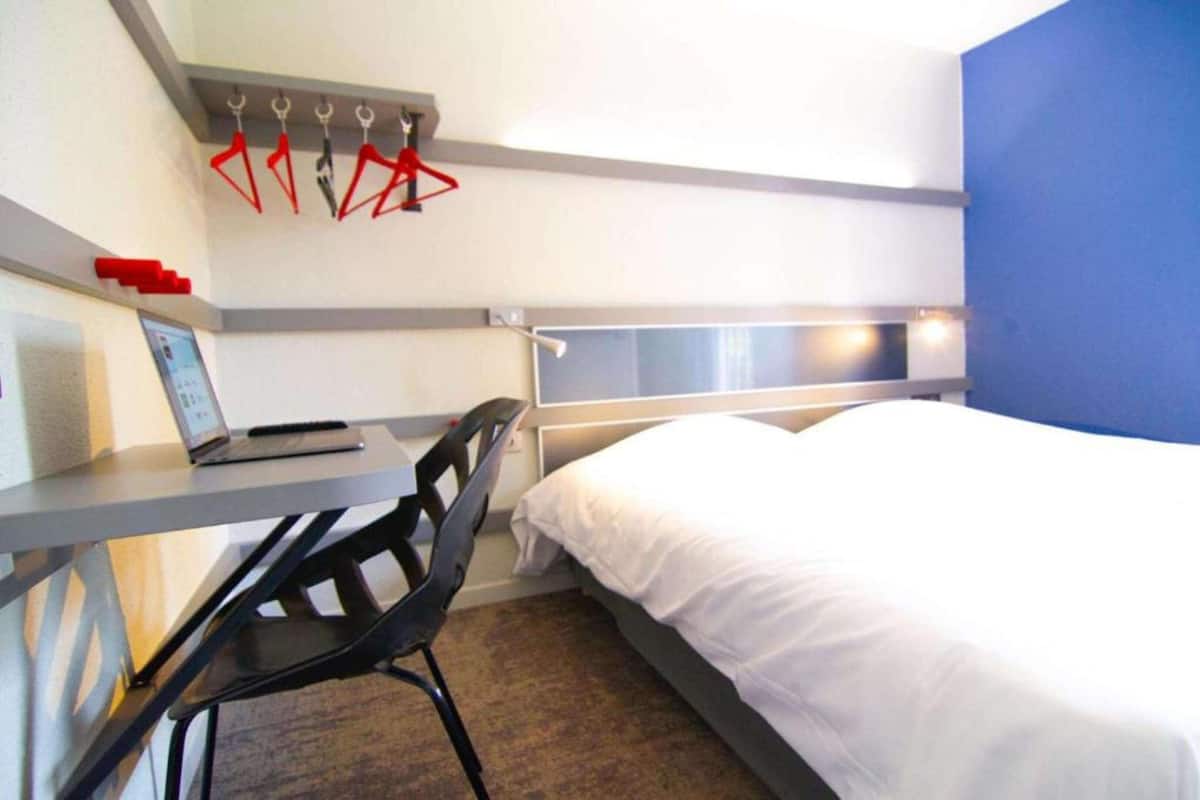 Desk, blackout curtains, free cots/infant beds, rollaway beds