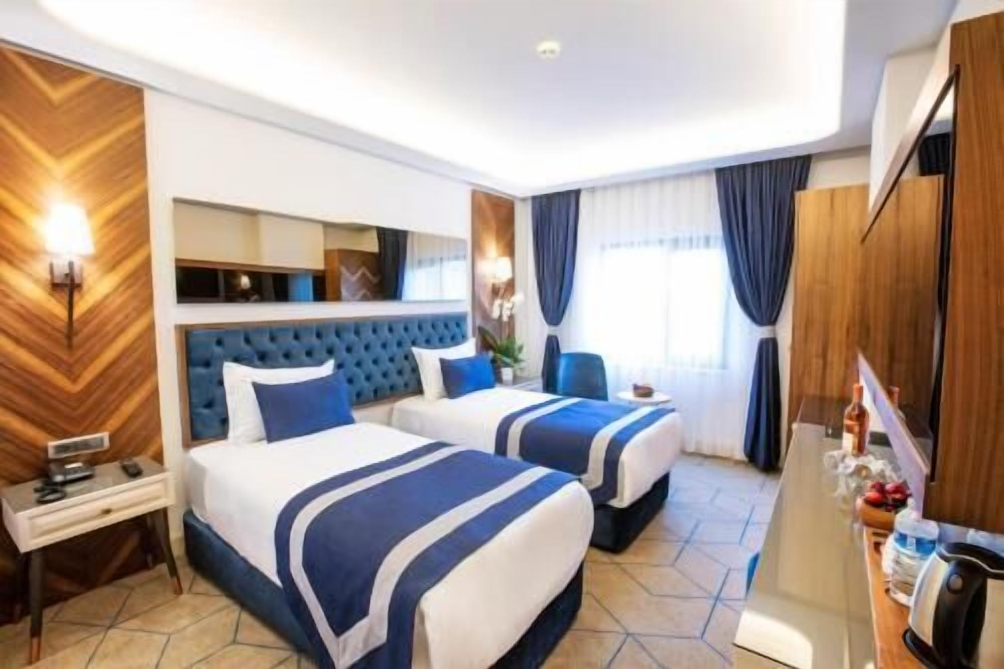 1 makuuhuone, ylelliset vuodevaatteet, minibaari, tallelokero huoneessa