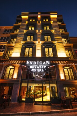 The exterior of the Endican Beyazit Hotel with its illuminated signage and entrance.