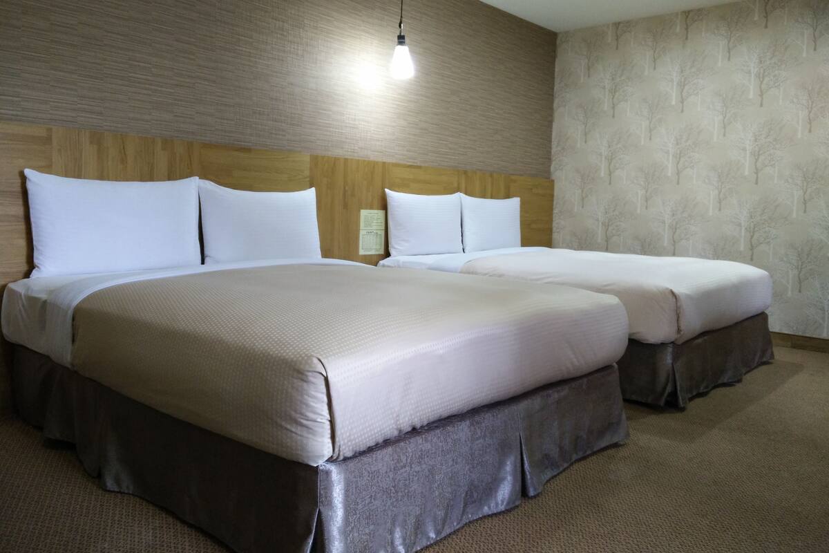 Family Room, 2 Double Beds | Premium bedding, down comforters, pillowtop beds, minibar