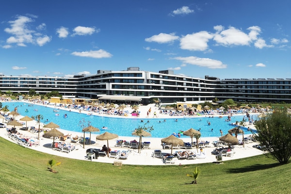 Indoor pool, seasonal outdoor pool, pool umbrellas, sun loungers