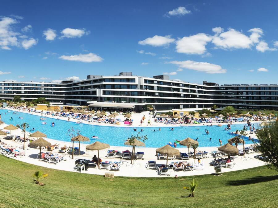 Indoor pool, seasonal outdoor pool, pool umbrellas, pool loungers