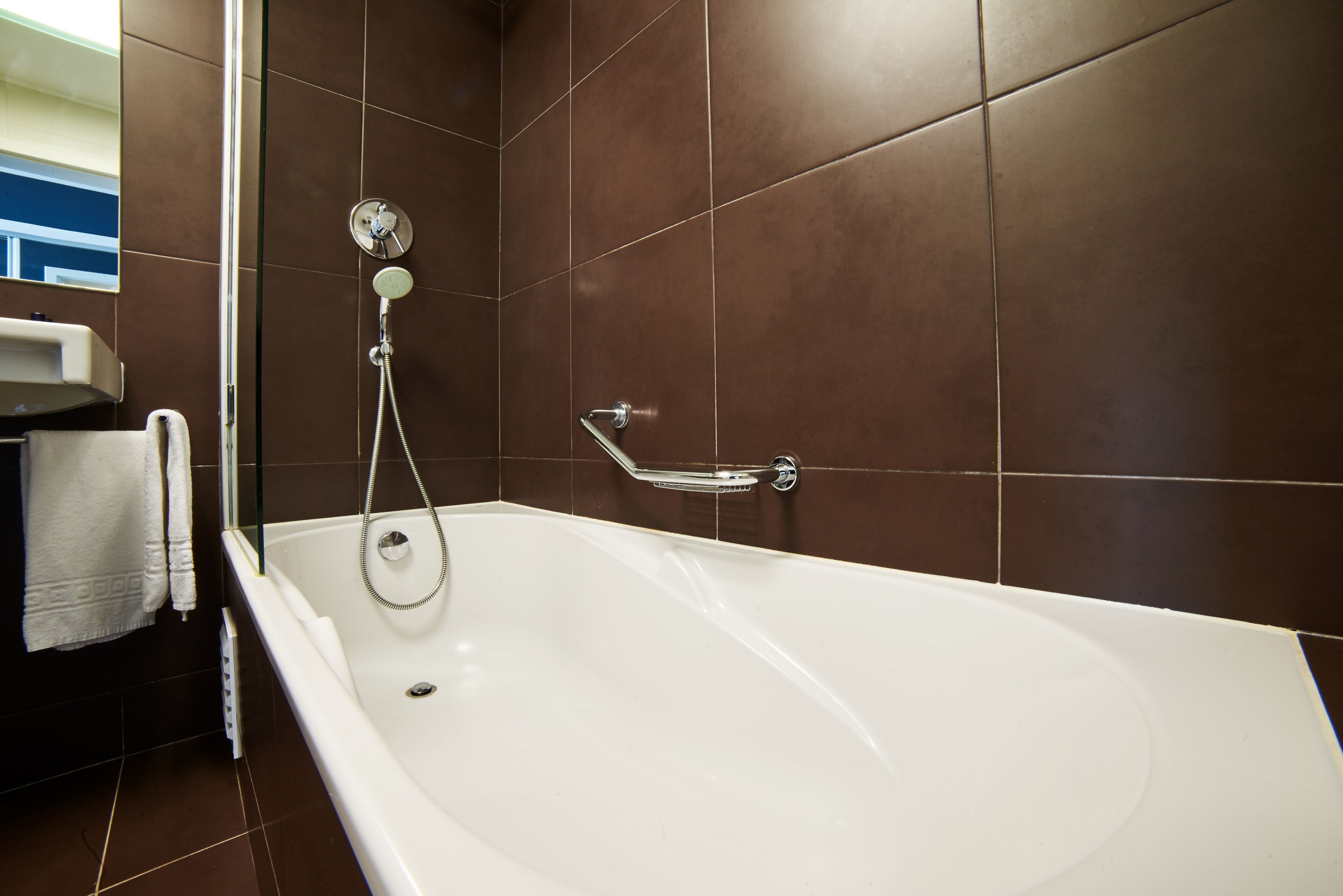 bathtub, free toiletries, hair dryer, bidet