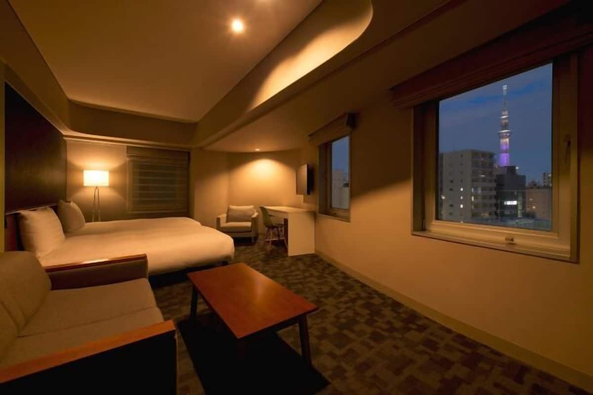 Luxe beddengoed, een kluis op de kamer, een strijkplank/strijkijzer