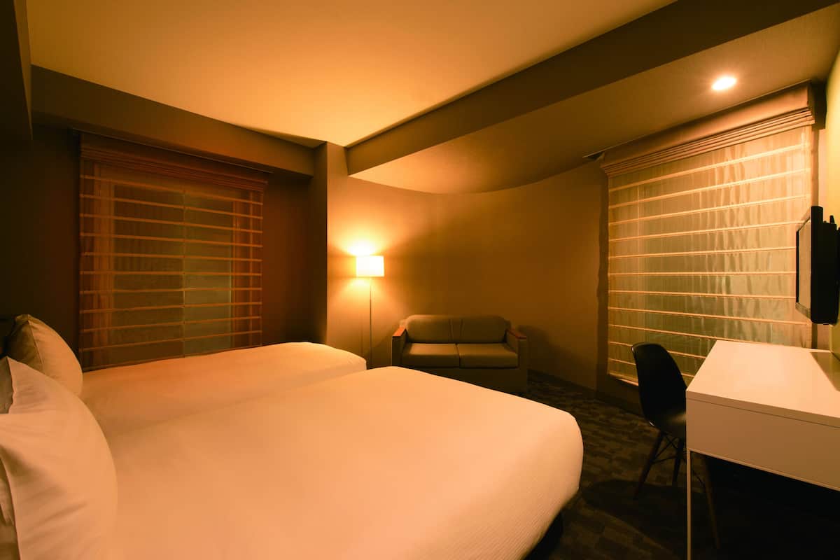 Luxe beddengoed, een kluis op de kamer, een strijkplank/strijkijzer