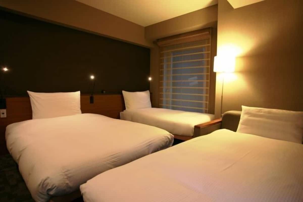 Luxe beddengoed, een kluis op de kamer, een strijkplank/strijkijzer
