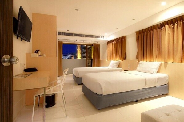 Deluxe Room, 2 Twin Beds | In-room safe, free WiFi, bed sheets